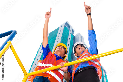 Photo: Asian architect and supervisor on construction site Asian architect and supervisor on construction site