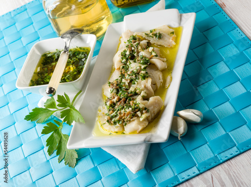 Photo: cod fillet marinated with parsley anchovy and garlic cod fillet marinated with parsley anchovy and garlic