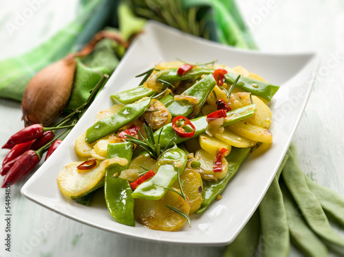Photo: potatoes salad with flat green beans, selective focus potatoes salad with flat green beans, selective focus