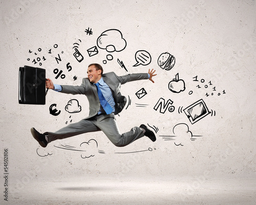Photo: Jumping young businessman Jumping young businessman