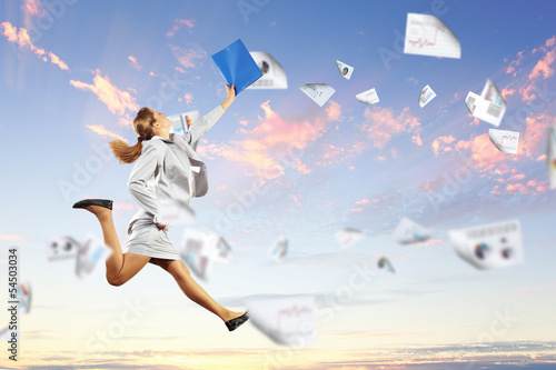 Photo: Image of jumping businesswoman Image of jumping businesswoman