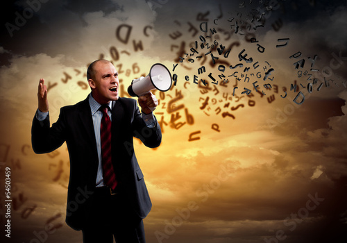 Photo: Businessman with megaphone Businessman with megaphone