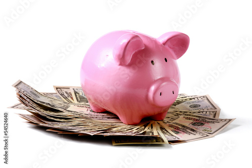 Photo: piggy bank on dollars piggy bank on dollars