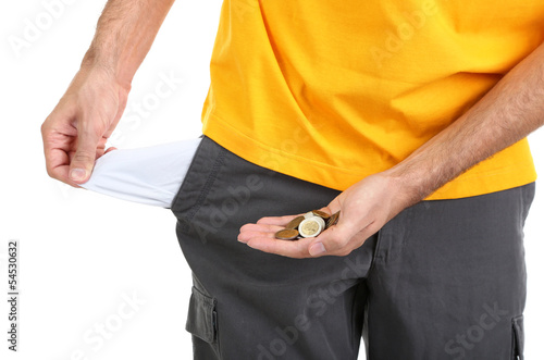 Photo: Man showing his empty pocket, isolated on white Man showing his empty pocket, isolated on white