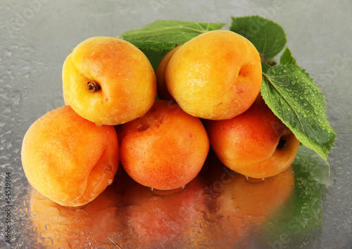 Photo: Apricots on metal background Apricots on metal background