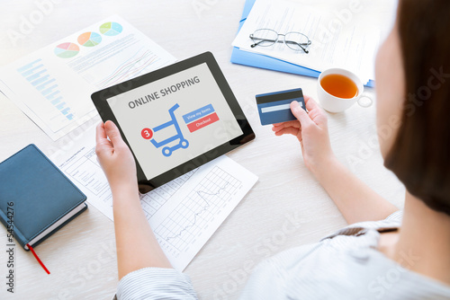 Photo: Online shopping with digital tablet Online shopping with digital tablet