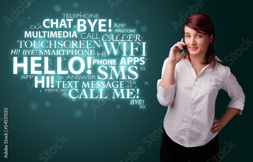 Photo: Young girl calling by phone with word cloud Young girl calling by phone with word cloud