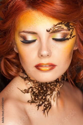 Photo: beauty shot of beautiful woman wearing professional make-up on beauty shot of beautiful woman wearing professional make-up on