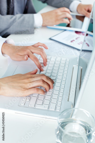 Photo: Using laptop Using laptop