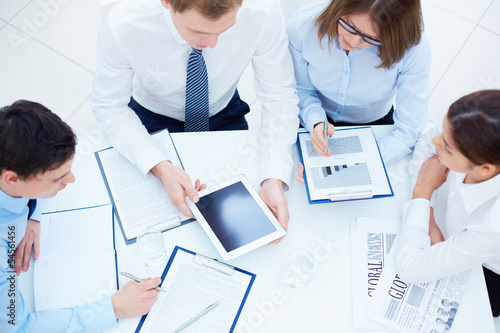 Photo: Discussing documents Discussing documents