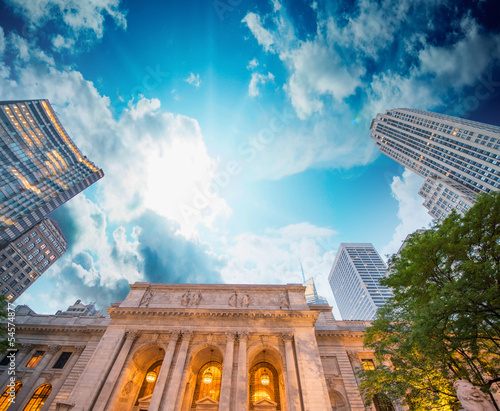 Photo: New York Public Library exterior with trees and surrounding buil New York Public Library exterior with trees and surrounding buil