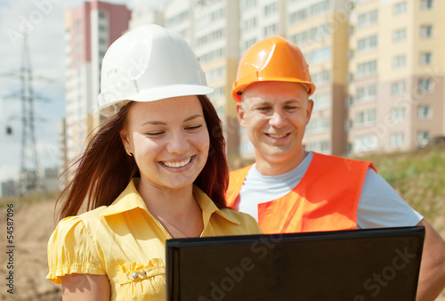 Photo: two happy builders two happy builders