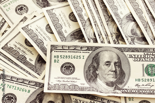 Photo: Cash spread of one hundred dollar bills Cash spread of one hundred dollar bills