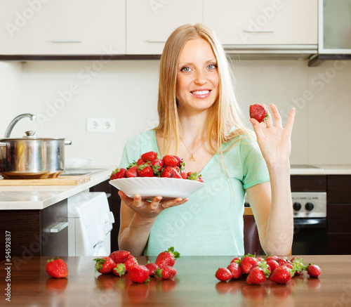 Photo: long-haired girl with strawberries long-haired girl with strawberries