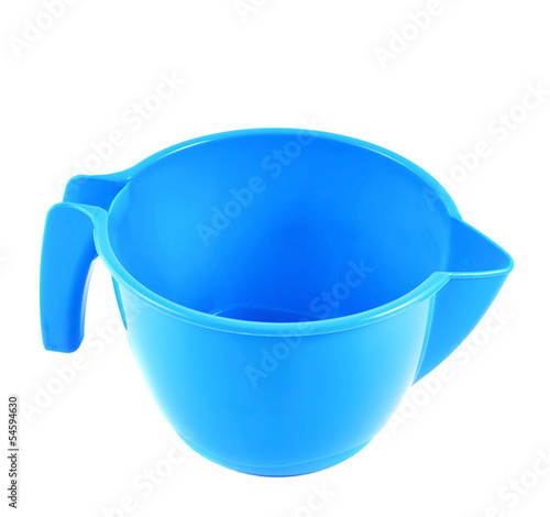 Photo: Plastic measuring cup isolated Plastic measuring cup isolated