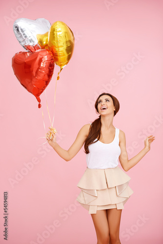 Photo: Cute brunette with balloons Cute brunette with balloons