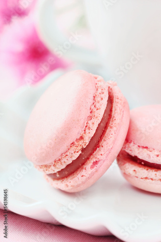Photo: Pink French macaroons with a cup of coffee Pink French macaroons with a cup of coffee