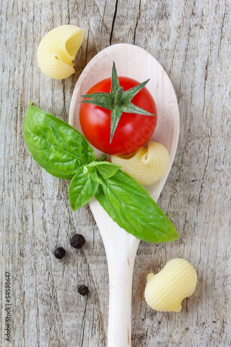 Photo: Italian cuisine concept. Typical ingredients with copy space Italian cuisine concept. Typical ingredients with copy space