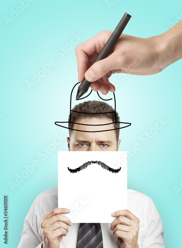 Photo: businessman holding paper businessman holding paper