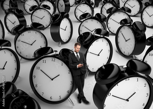 Photo: businessman and many clock businessman and many clock