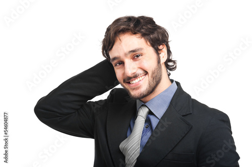 Photo: Smiling businessman isolated on white Smiling businessman isolated on white