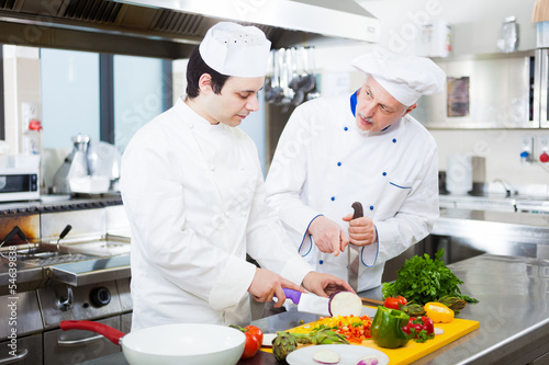 Photo: Professional chefs at work Professional chefs at work