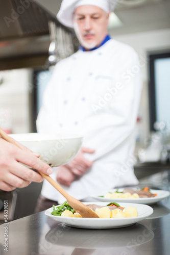 Photo: Professional chefs at work Professional chefs at work