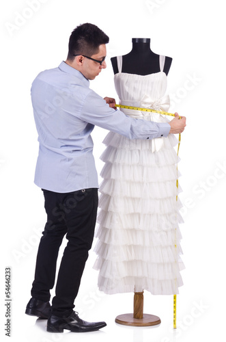 Photo: Funny male tailor on white Funny male tailor on white