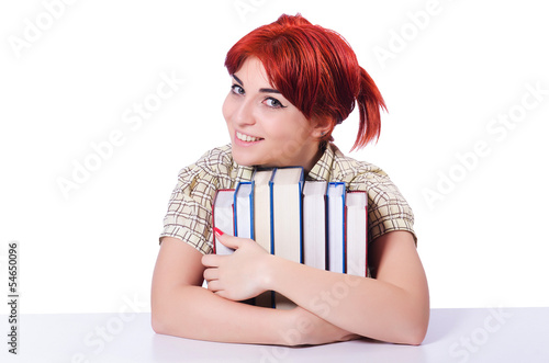 Photo: Girl student with books on white Girl student with books on white