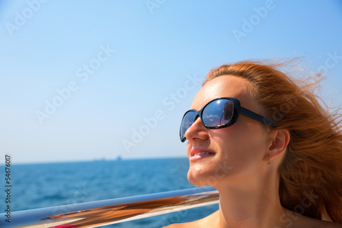 Photo: Young woman on yacht Young woman on yacht