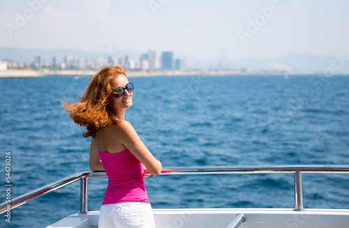 Photo: Young woman on yacht Young woman on yacht