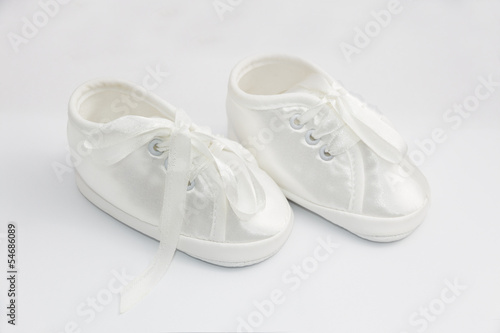 Photo: Little shoes for baptism infant. Little shoes for baptism infant.