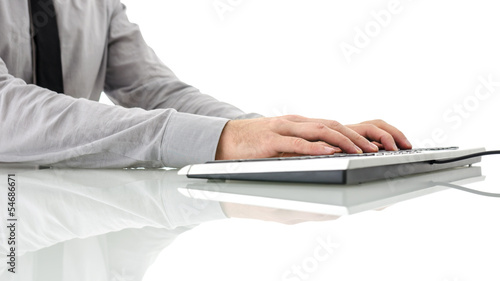 Photo: Typing on computer keyboard Typing on computer keyboard