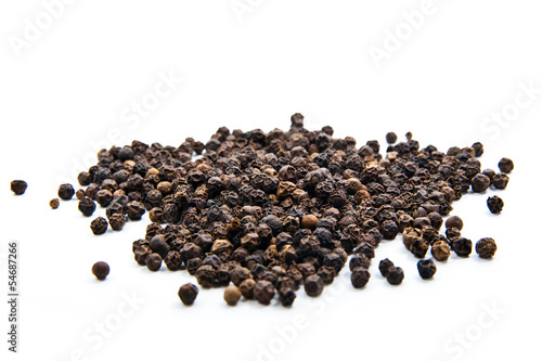Photo: Black pepper isolated on the white background Black pepper isolated on the white background