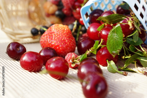 Photo: Sweet summer berries: strawberries, cherry, currant, raspberry Sweet summer berries: strawberries, cherry, currant, raspberry