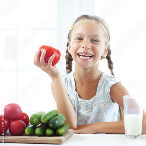 Photo: Child eating vegetables Child eating vegetables
