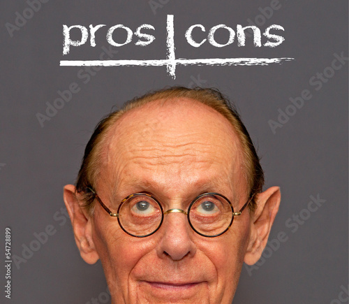 Photo: Man with Checklist - pros and cons Man with Checklist - pros and cons