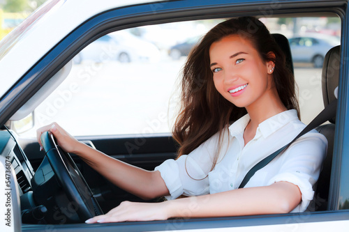 Photo: Pretty girl in a car Pretty girl in a car