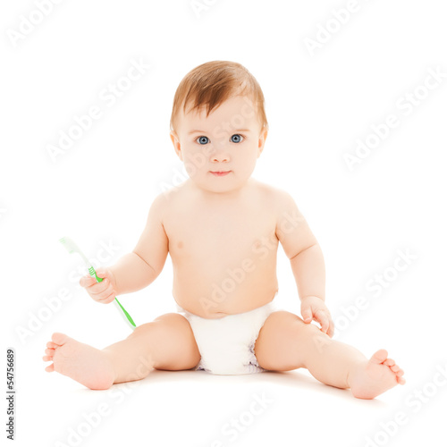 Photo: curious baby brushing teeth curious baby brushing teeth
