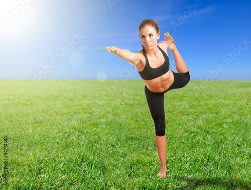 Photo: Woman Doing Yoga Woman Doing Yoga
