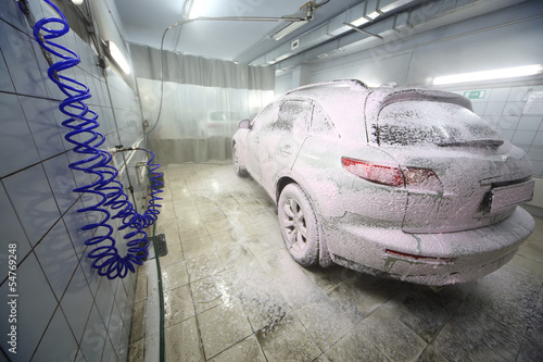 Photo: The car in the foam at the car wash The car in the foam at the car wash
