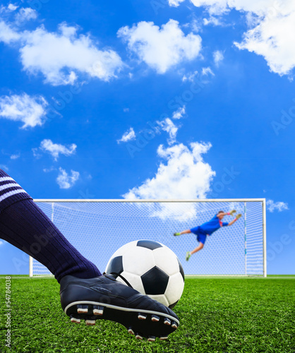 Photo: foot shooting soccer ball to goal, penalty foot shooting soccer ball to goal, penalty
