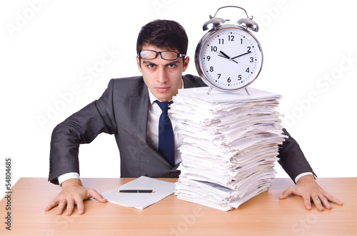 Photo: Woman businessman with giant alarm clock Woman businessman with giant alarm clock