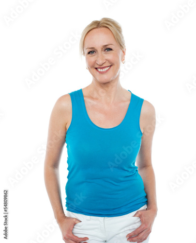 Photo: Pretty woman in bright blue sleeveless top Pretty woman in bright blue sleeveless top