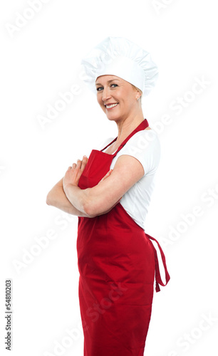Photo: Cheerful confident female chef Cheerful confident female chef