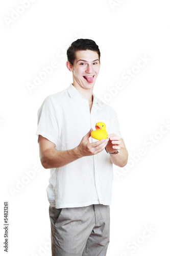 Photo: man holding yellow rubber duck man holding yellow rubber duck