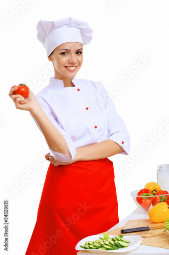 Photo: Young cook preparing food Young cook preparing food