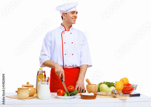 Photo: Young cook preparing food Young cook preparing food