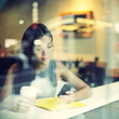 Cafe city lifestyle woman on phone drinking coffee Cafe city lifestyle woman on phone drinking coffee