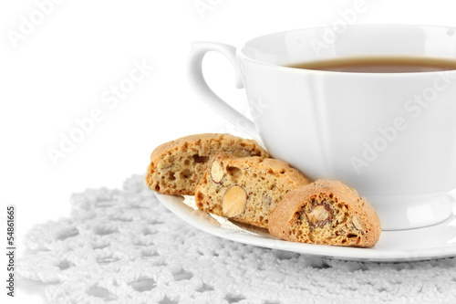 Photo: Aromatic cookies cantuccini and cup of coffee isolated on white Aromatic cookies cantuccini and cup of coffee isolated on white